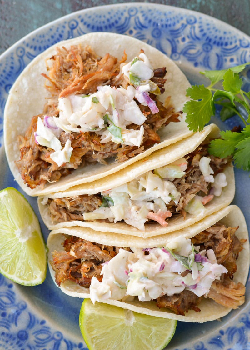  These Slow Cooker Pork Carnitas are a cinch to make and totally addictive! Top them with fresh jalapeño slaw for the ultimate easy, healthy meal!  