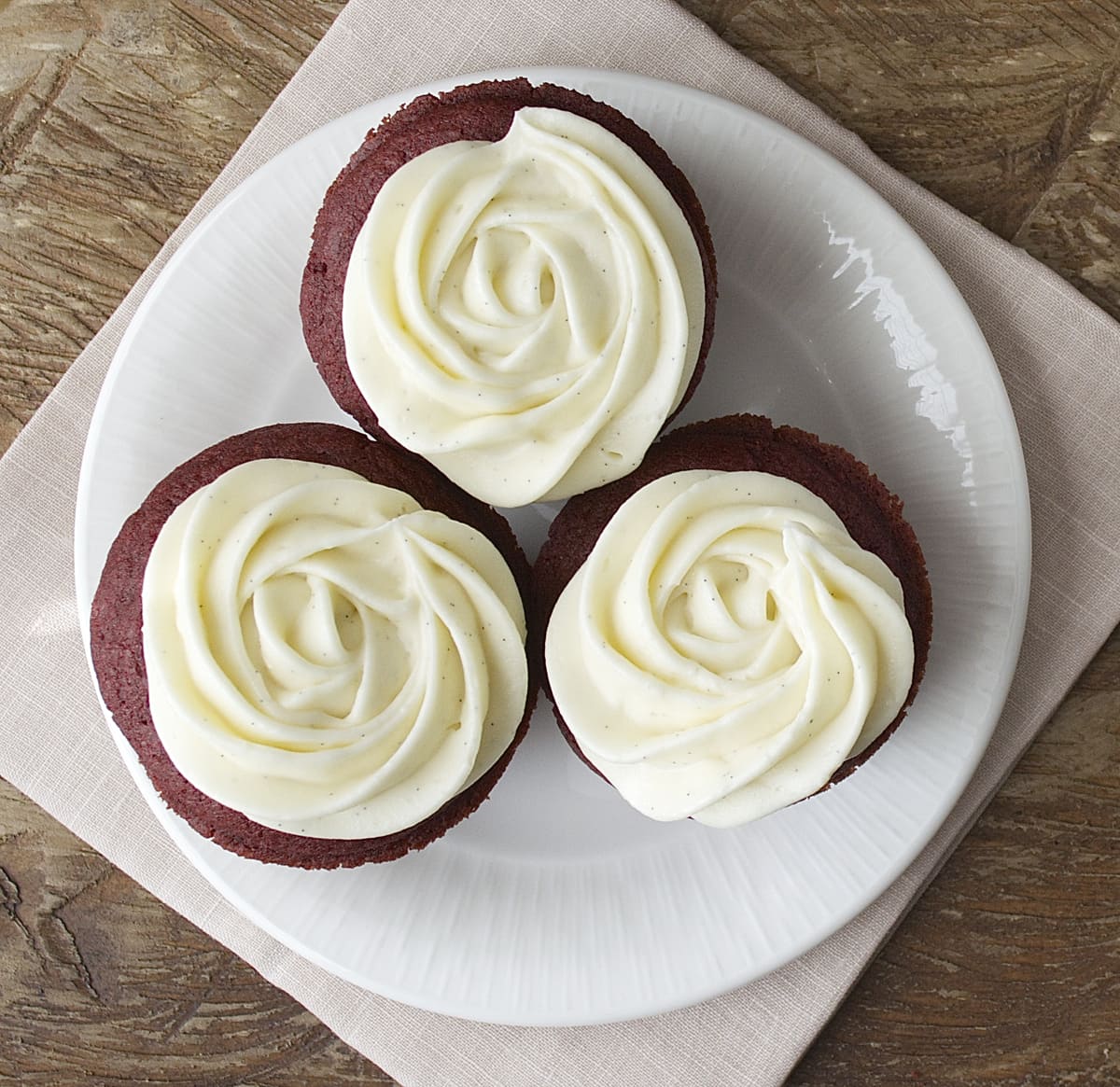 These gluten free Red Velvet Cupcakes are moist and delicious! Topped with Vanilla Cream Cheese Icing they are a dessert that is hard to beat!