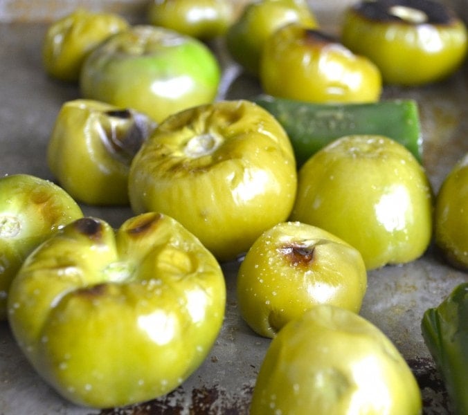 Roasted tomatillos on a baking sheet 