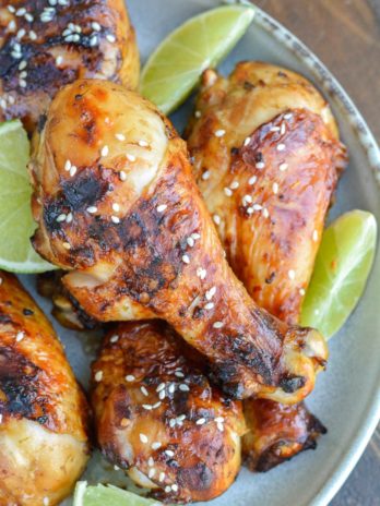 Grilled Chicken Legs are the perfect easy dinner recipe! This chicken is marinaded in an Asian sauce that pairs perfectly with grilled vegetables!