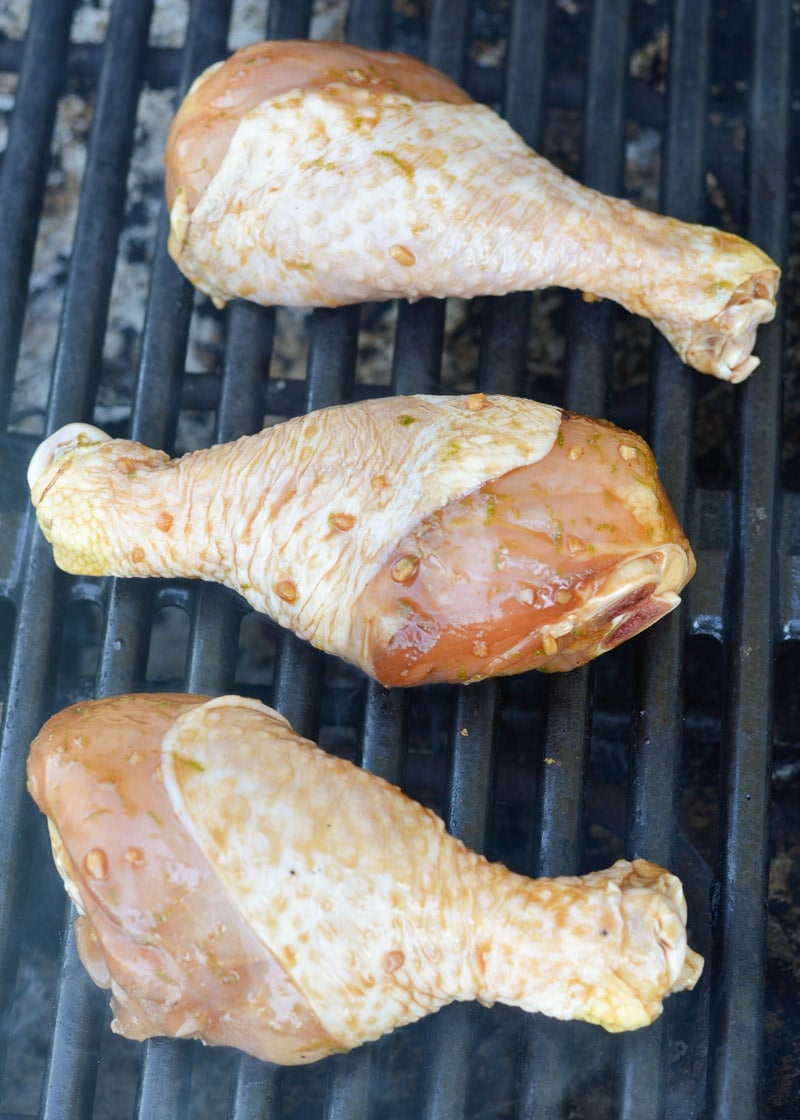 Grilled Chicken Legs are the perfect easy dinner recipe! This chicken is marinaded in an Asian sauce that pairs perfectly with grilled vegetables!