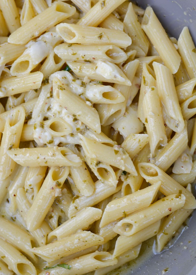 This one-pan Creamy Penne Pesto Pasta is packed with flavor and ready in just 10 minutes! Perfect for an easy weeknight meal!