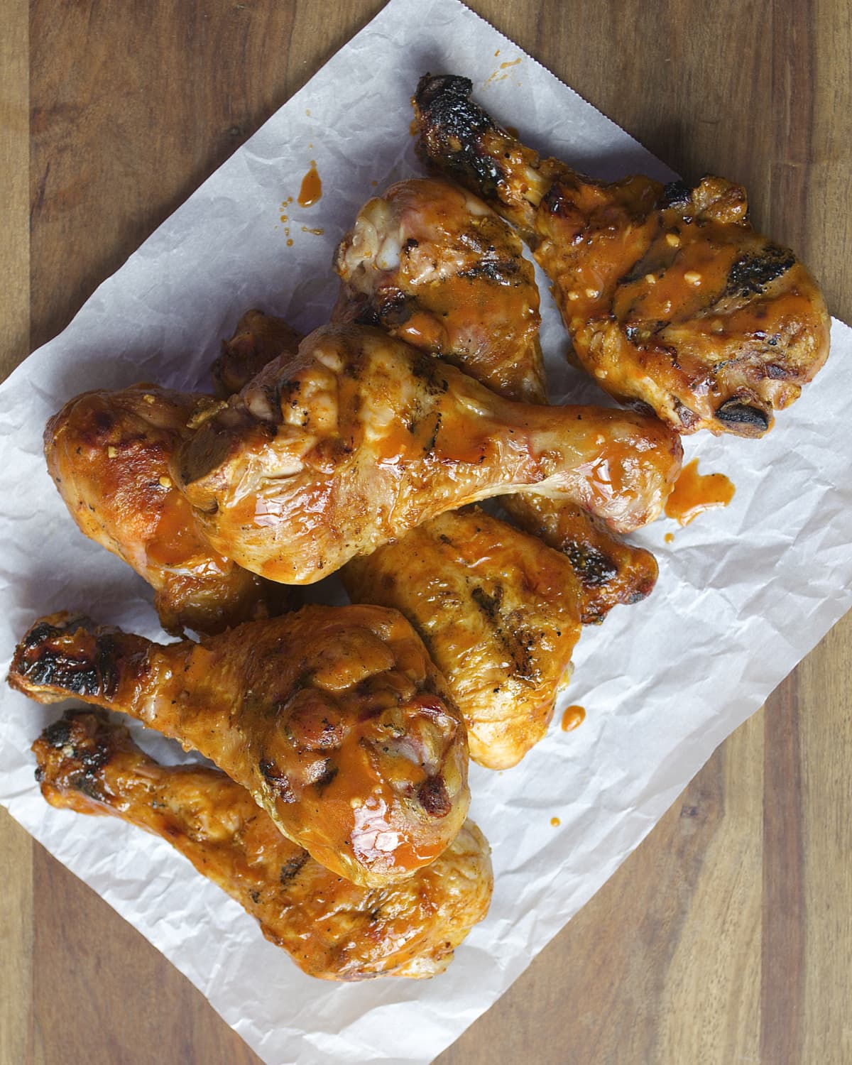 Drumsticks are smoked until they are perfectly tender then tossed in a tangy buffalo sauce! Ready in under 30 minutes!