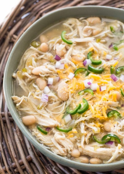 Using your Slow Cooker makes this White Bean Chicken Chili  a cinch! Just toss in your ingredients, and let it simmer all day! Come home to a warm, filling bowl of soup!