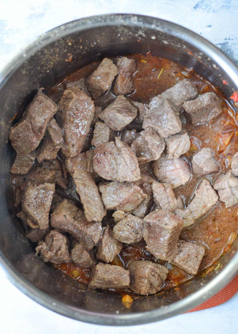 This Instant Pot Keto Beef Stew is loaded with tender shredded beef, and vegetables in a savory broth. Each serving of this stew is about 5 net carbs! This is the perfect low carb comfort food with stove-top, Instant Pot, or slow cooker directions! 