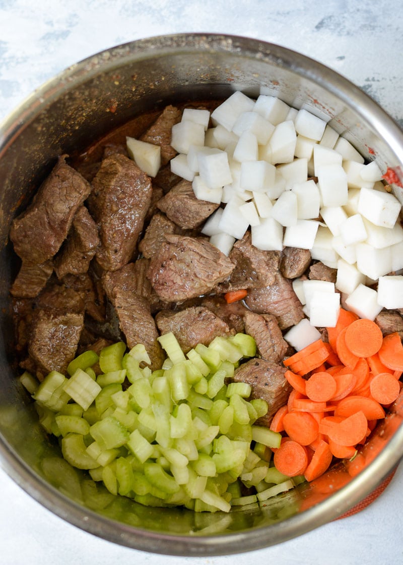 This Instant Pot Keto Beef Stew is loaded with tender shredded beef, and vegetables in a savory broth. Each serving of this stew is about 5 net carbs! This is the perfect low carb comfort food with stove-top, Instant Pot, or slow cooker directions! 