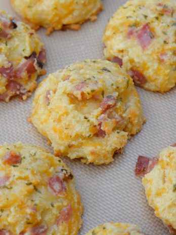 These giant soft and fluffy Keto Ham and Swiss Biscuits are the perfect grab and go breakfast recipe! Each biscuit has about 3 net carbs and is perfect with scrambled eggs! 