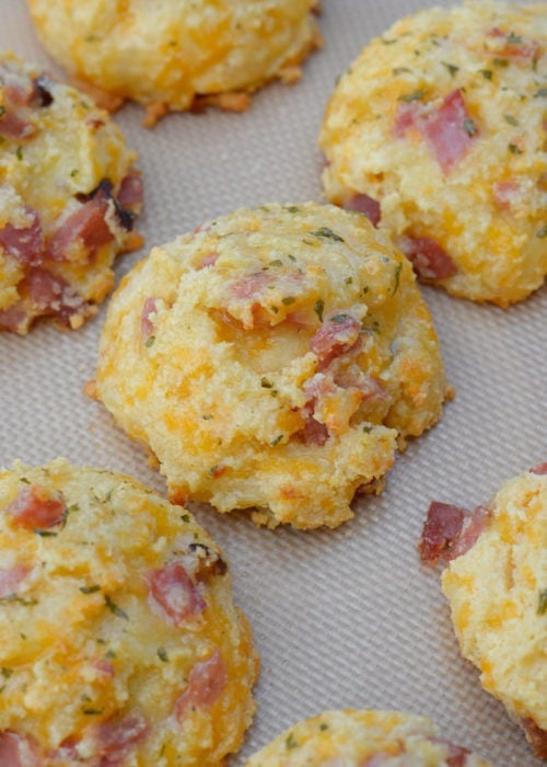 These giant soft and fluffy Keto Ham and Swiss Biscuits are the perfect grab and go breakfast recipe! Each biscuit has about 3 net carbs and is perfect with scrambled eggs! 