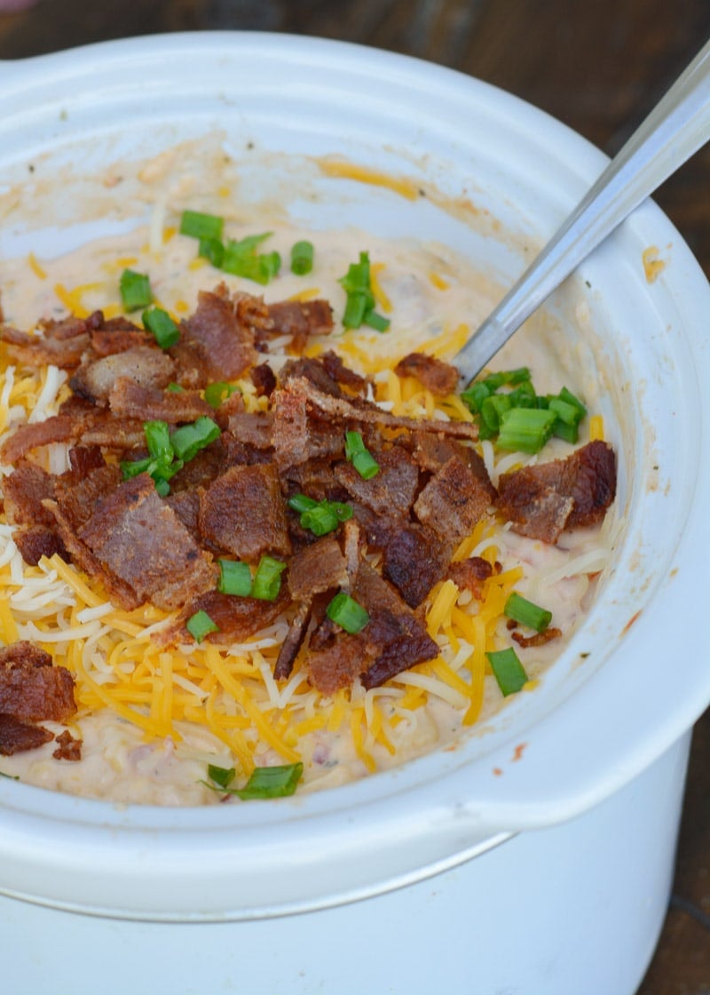 Slow Cooker Corn Dip makes for an impressive appetizer without any work! Just toss your ingredients in the slow cooker and come home to a creamy, cheesy dip!