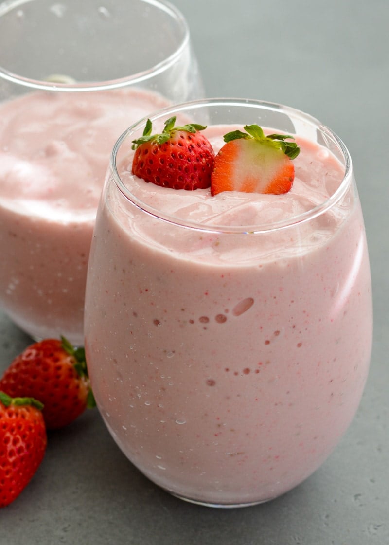 This Strawberry Oatmeal Smoothie comes together in less than 5 minutes and is packed with good-for-you ingredients! Perfect for a quick breakfast or morning snack! 