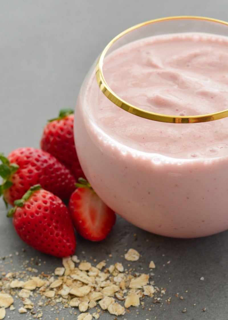 This Strawberry Oatmeal Smoothie comes together in less than 5 minutes and is packed with good-for-you ingredients! Perfect for a quick breakfast or morning snack! 