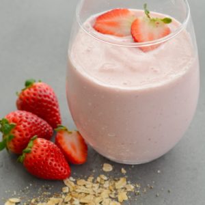 This Strawberry Oatmeal Smoothie comes together in less than 5 minutes and is packed with good-for-you ingredients! Perfect for a quick breakfast or morning snack! 
