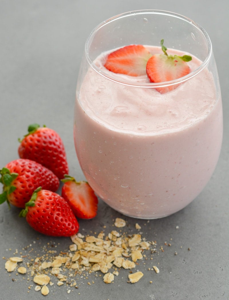 This Strawberry Oatmeal Smoothie comes together in less than 5 minutes and is packed with good-for-you ingredients! Perfect for a quick breakfast or morning snack! 