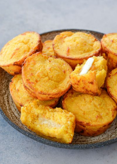 These Sweet Potato and White Cheddar Corn Muffins are extra the perfect combo of sweet and savory! This easy cornbread recipe is perfect for pairing with soups!