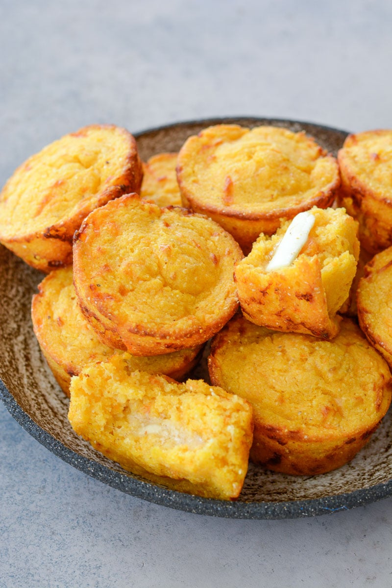 These Sweet Potato and White Cheddar Corn Muffins are extra the perfect combo of sweet and savory! This easy cornbread recipe is perfect for pairing with soups!