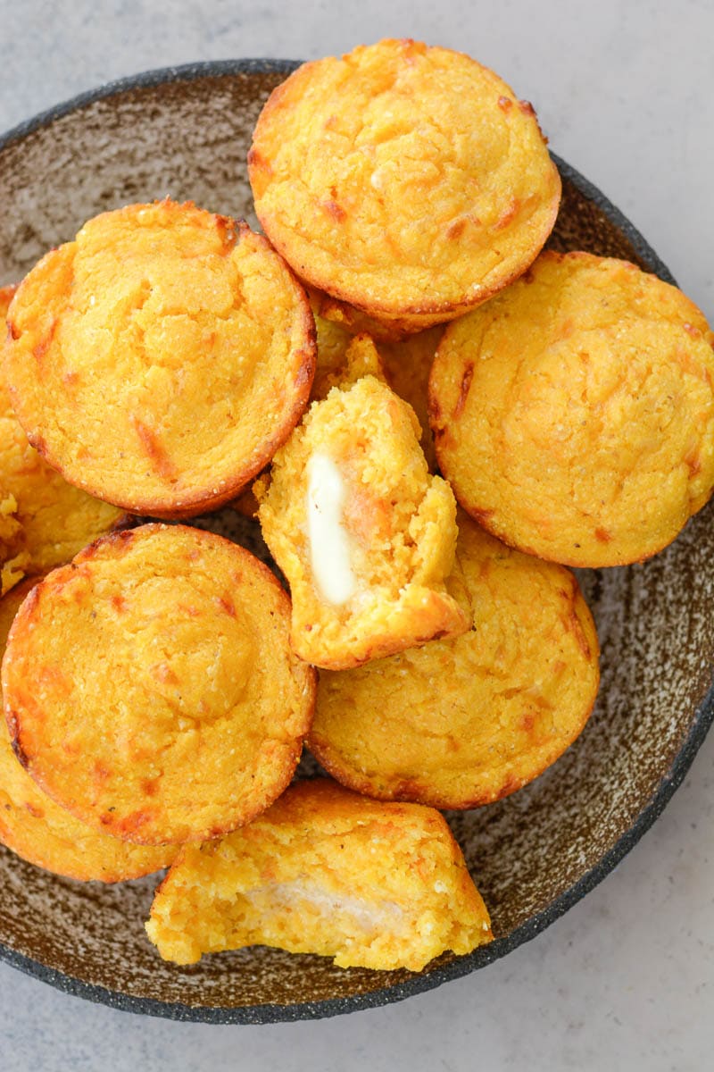 These Sweet Potato and White Cheddar Corn Muffins are extra the perfect combo of sweet and savory! This easy cornbread recipe is perfect for pairing with soups!