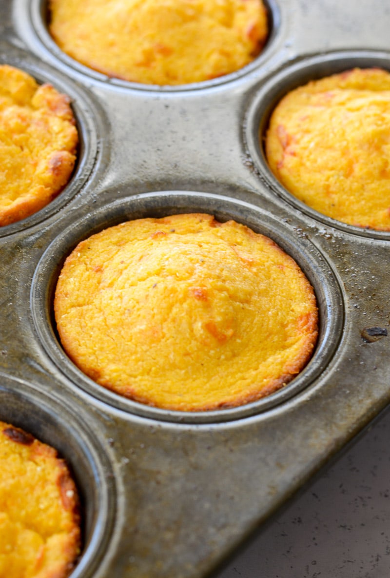 These Sweet Potato and White Cheddar Corn Muffins are extra the perfect combo of sweet and savory! This easy cornbread recipe is perfect for pairing with soups!
