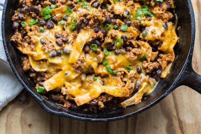 overhead view of ground beef skillet enchiladas 