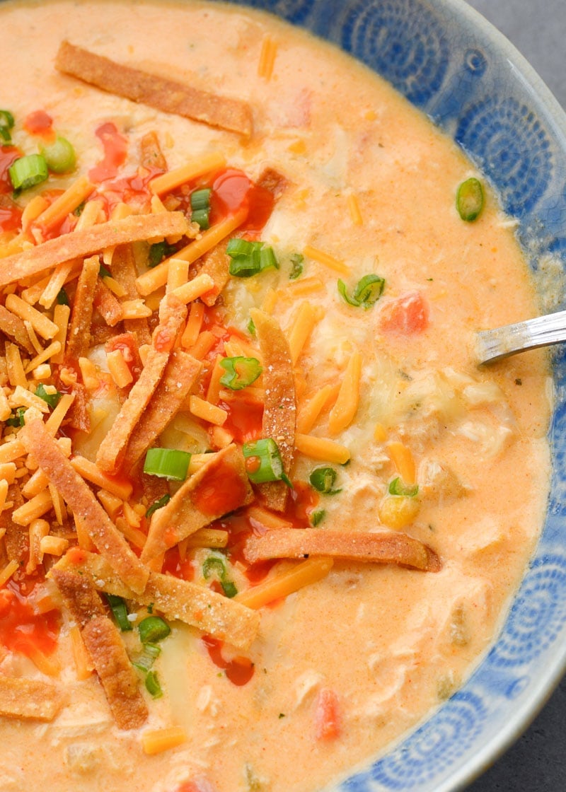 This Slow Cooker Buffalo Chicken Chili is loaded with shredded chicken, white beans, vegetables, sharp cheddar cheese and tangy buffalo sauce!