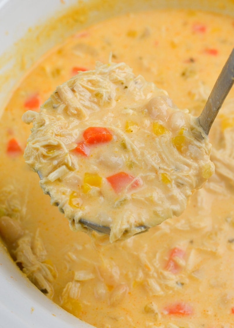 This Slow Cooker Buffalo Chicken Chili is loaded with shredded chicken, white beans, vegetables, sharp cheddar cheese and tangy buffalo sauce!