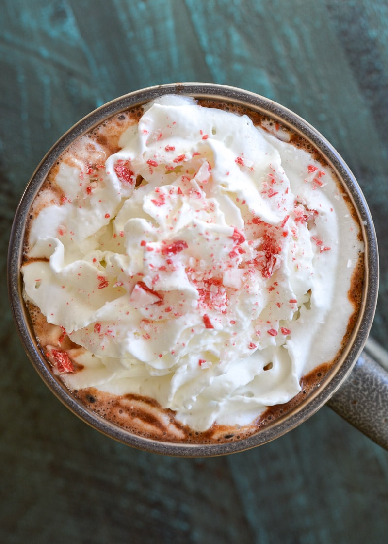 This Slow Cooker Peppermint Mocha Hot Cocoa features ultra rick hot chocolate spiked with peppermint extract and espresso! 
