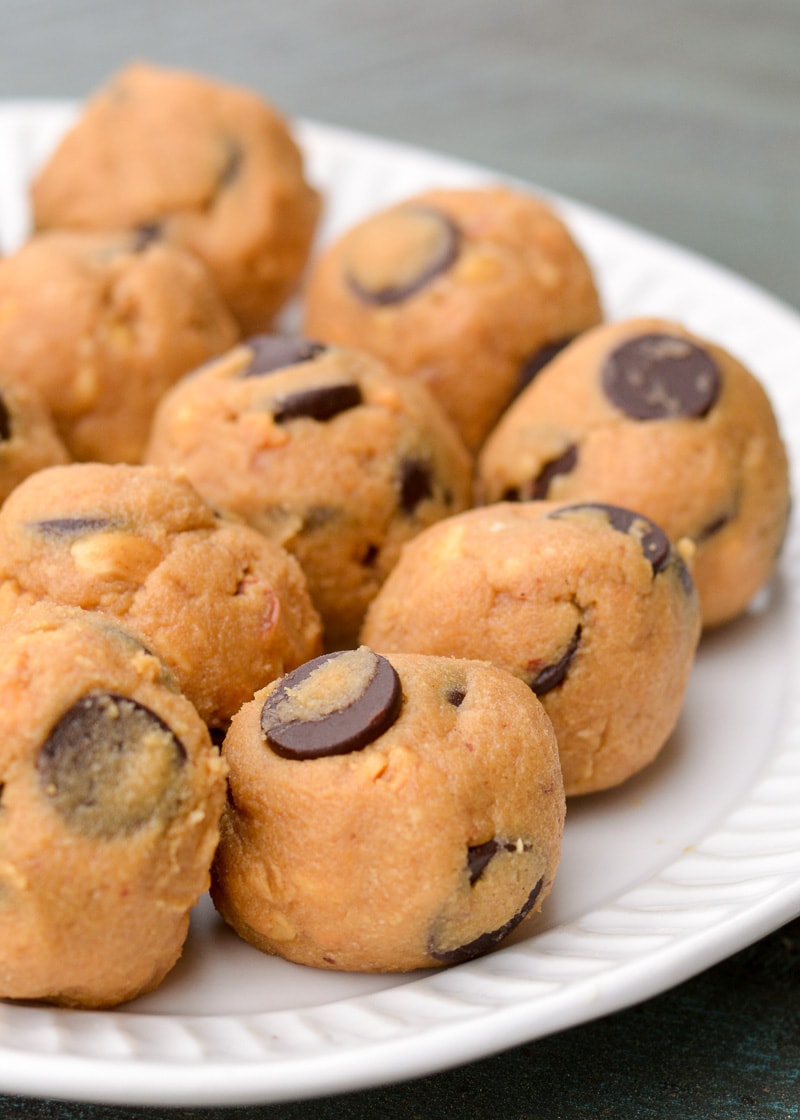 These Chocolate Peanut Butter Balls are the perfect keto snack! Creamy peanut butter is blended with a low carb caramel sauce, protein powder and chocolate chips, making these keto sweets protein packed!