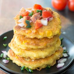 These Green Chile Corn Fritters are loaded with Tex Mex flavor and bacon! This is the perfect easy appetizer or gluten free dinner!