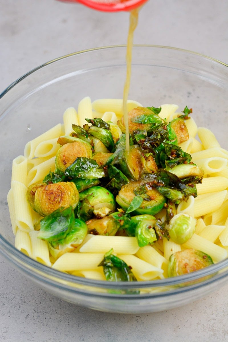 This five ingredient Penne with Brussels Sprouts and Parmesan is swimming in a rich brown butter sauce. The perfect vegetarian meal or quick and easy side dish!