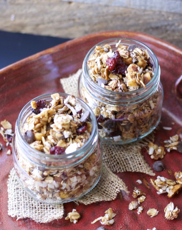 This loaded granola is packed with rich dark chocolate, tart cranberries, cinnamon coconut, nuts, and seeds! It is the perfect grab and go snack for any occasion! 