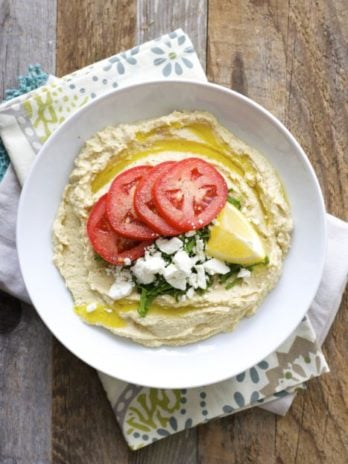 This Easy Feta Hummus dip is full of Greek-inspired flavor! Eat it with vegetables, sandwiches, salads and so much more. This healthy snack goes great with everything!