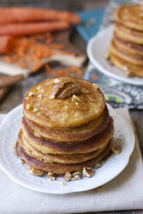 Who said pancakes are unhealthy?! These Carrot Cake Pancakes are packed with fresh carrots, yogurt, ginger, cinnamon, and nutmeg. A delicious and nutritious way to start your morning! 