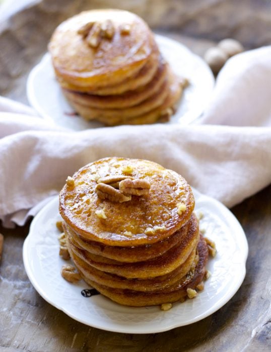 Who said pancakes are unhealthy?! These Carrot Cake Pancakes are packed with fresh carrots, yogurt, ginger, cinnamon, and nutmeg. A delicious and nutritious way to start your morning! 