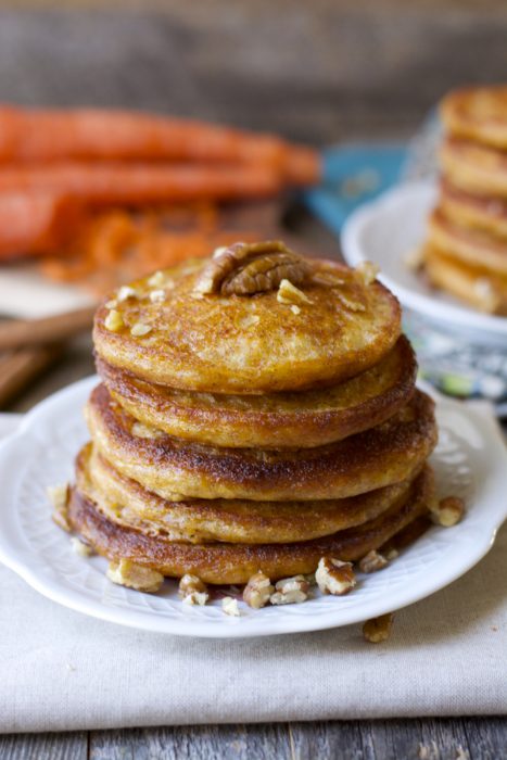 Who said pancakes are unhealthy?! These Carrot Cake Pancakes are packed with fresh carrots, yogurt, ginger, cinnamon, and nutmeg. A delicious and nutritious way to start your morning! 