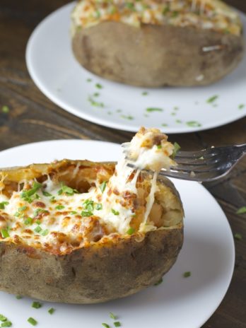 Pizza Stuffed Baked Potato! Everything you love about pizza stuffed in a perfect baked potato!