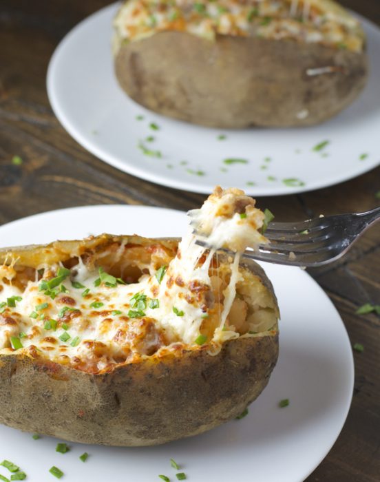 Pizza Stuffed Baked Potato! Everything you love about pizza stuffed in a perfect baked potato! 