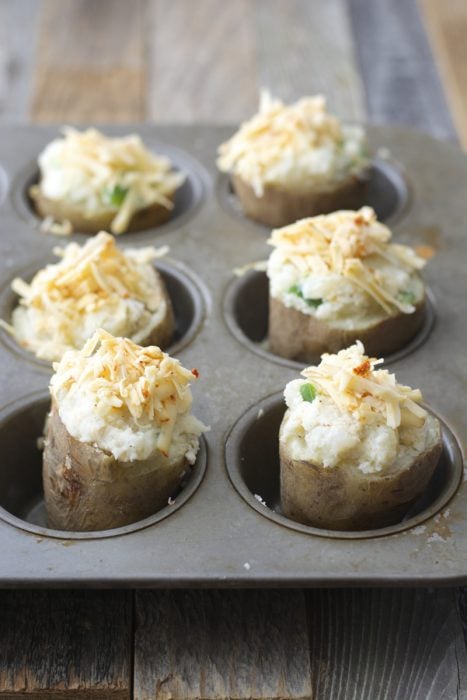 Tender potatoes are packed with chipotle gouda cheese, chopped jalapenos, butter, and sour cream for the ultimate side dish! These Gouda and Jalapeno Twice Baked Potatoes will be a new family favorite!