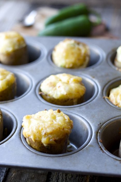 Tender potatoes are packed with chipotle gouda cheese, chopped jalapenos, butter, and sour cream for the ultimate side dish! These Gouda and Jalapeno Twice Baked Potatoes will be a new family favorite!