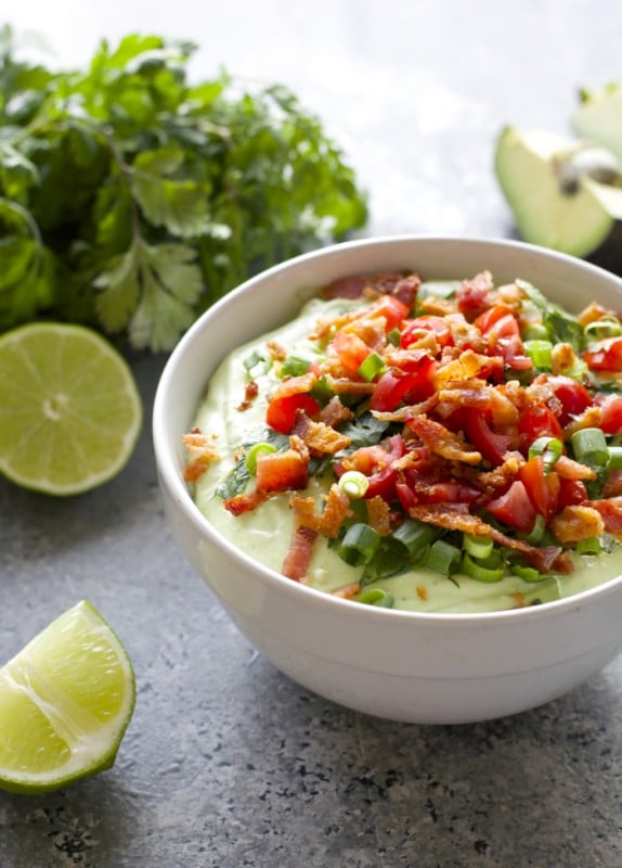 Avocado Bacon Dip! Creamy Avocado, light sour cream, ranch seasoning and crisp bacon make for the perfect Summer appetizer!