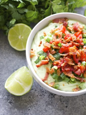 Avocado Bacon Dip! Creamy Avocado, light sour cream, ranch seasoning and crisp bacon make for the perfect Summer appetizer!