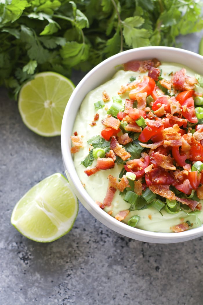 Avocado Bacon Dip! Creamy Avocado, light sour cream, ranch seasoning and crisp bacon make for the perfect Summer appetizer!