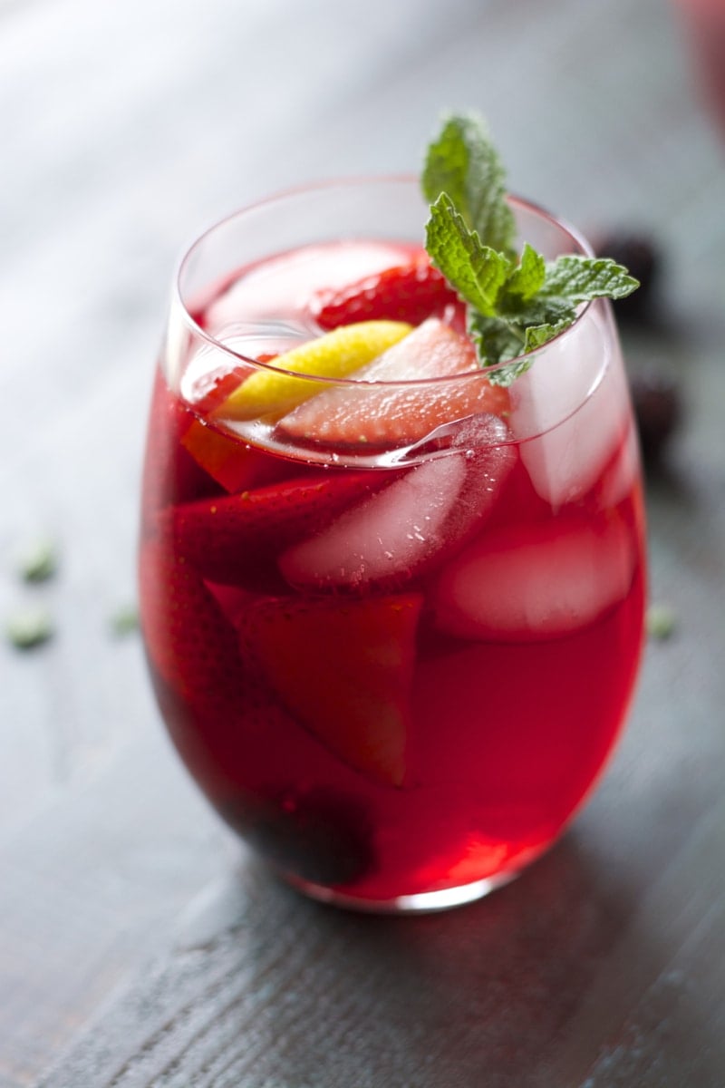 Passion Fruit Tea packed with fresh lemon, berries and mint! Super refreshing!