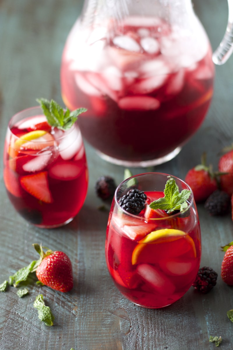 Passion Fruit Tea packed with fresh lemon, berries and mint! Super refreshing!