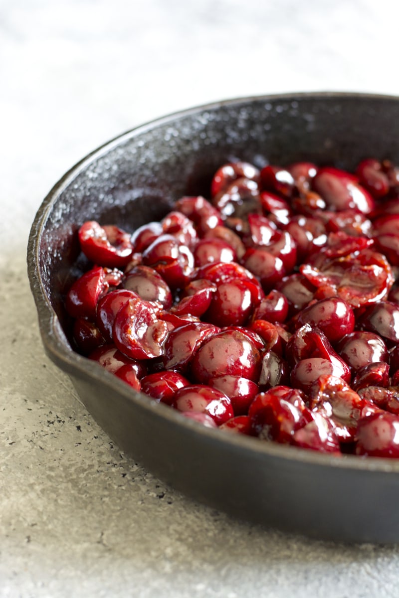 Fresh cherry filling in a cast iron skillet 