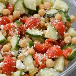This Healthy Chickpea Salad is packed with chopped cucumbers, cherry tomatoes, chickpeas, feta and tossed in a simple lemon vinaigrette.