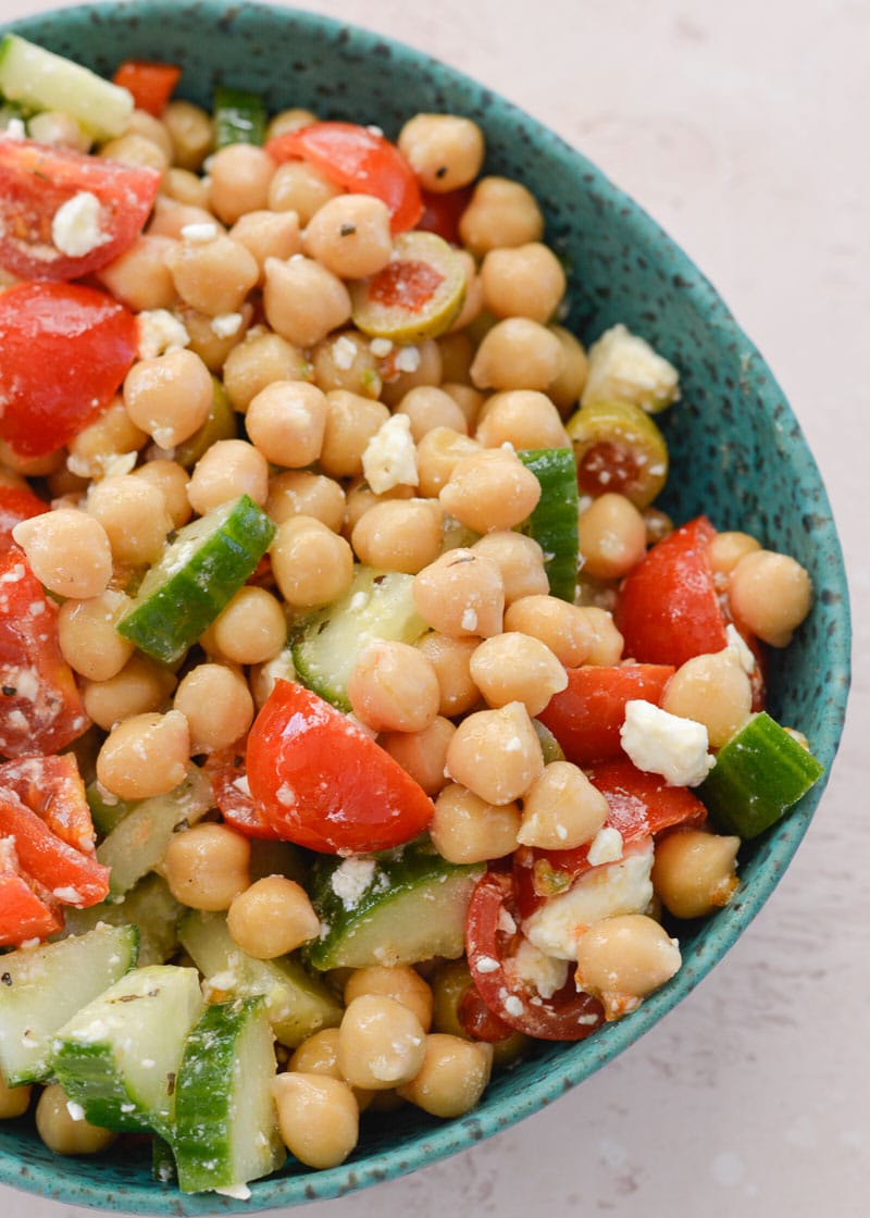 This Healthy Chickpea Salad is packed with chopped cucumbers, cherry tomatoes, chickpeas, feta and tossed in a simple lemon vinaigrette.