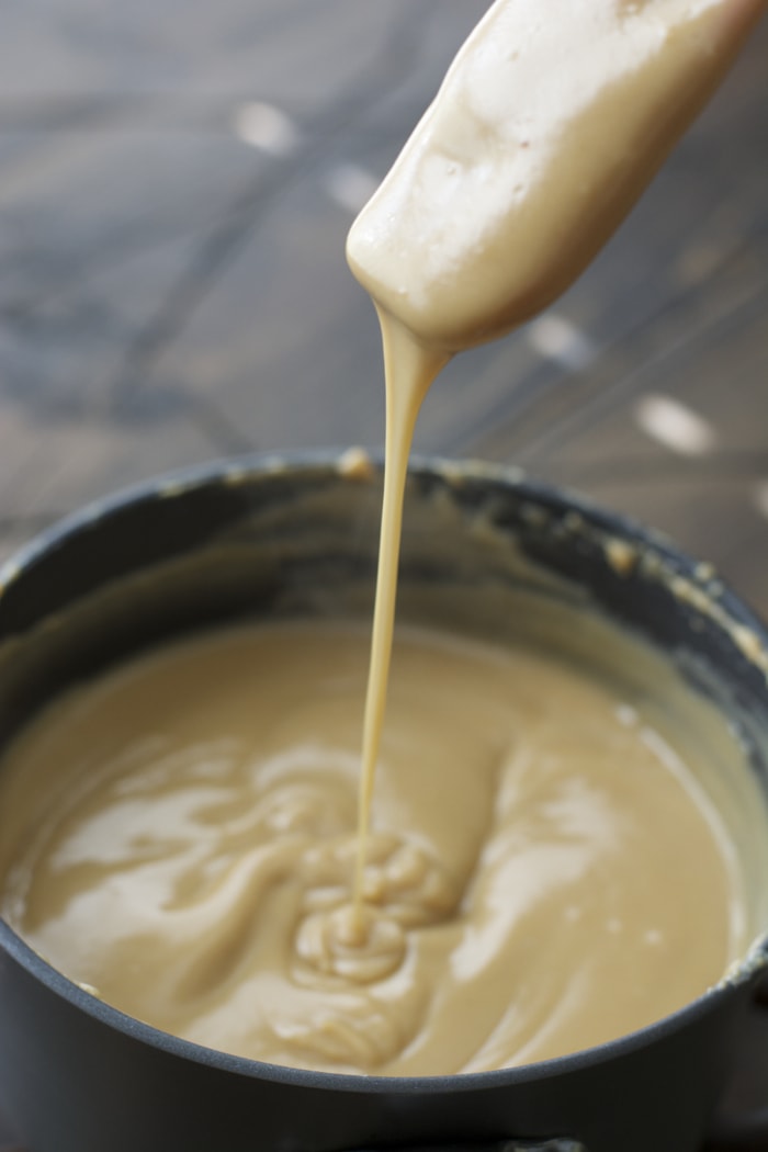 Sweet and creamy Peanut Butter Fudge sauce is paired with Vanilla Bean ice cream and fizzy Dr. Pepper for the ultimate Summer float!