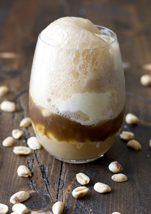 Sweet and creamy Peanut Butter Fudge sauce is paired with Vanilla Bean ice cream and fizzy Dr. Pepper for the ultimate Summer float!