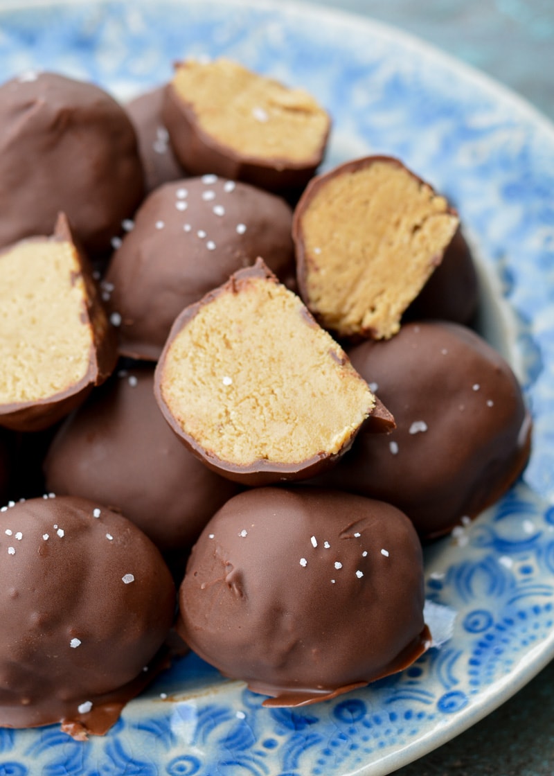 These sweet Peanut Butter Balls are the perfect no bake, low carb treat! Each peanut butter bite has about 3 net carbs making it the perfect low carb snack recipe! 
