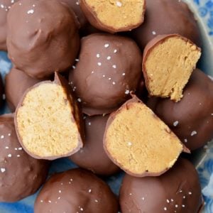 These sweet Peanut Butter Balls are the perfect no bake, low carb treat! Each peanut butter bite has about 3 net carbs making it the perfect low carb snack recipe! 