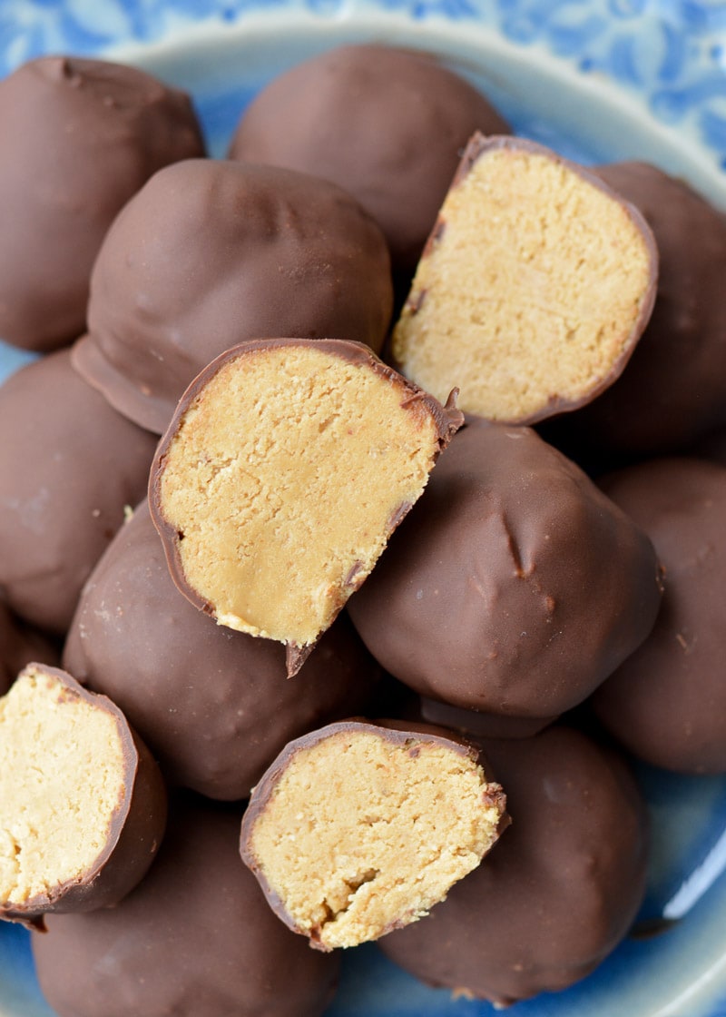 These sweet Peanut Butter Balls are the perfect no bake, low carb treat! Each peanut butter bite has about 3 net carbs making it the perfect low carb snack recipe! 